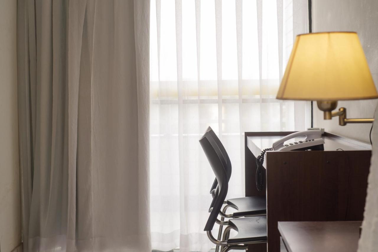 Ibituruna Center Hotel 瓦拉达里斯州长市 外观 照片